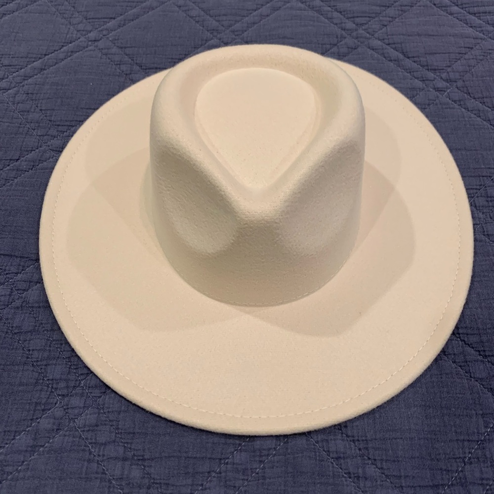 New stylish boutique,  Ivory hat, never worn.